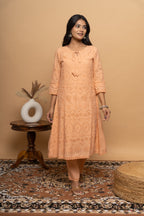 Front view of orange cotton suit set for women by Poshida