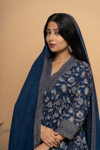 Close-up embroidery and fabric detail on indigo cotton suit set by Poshida