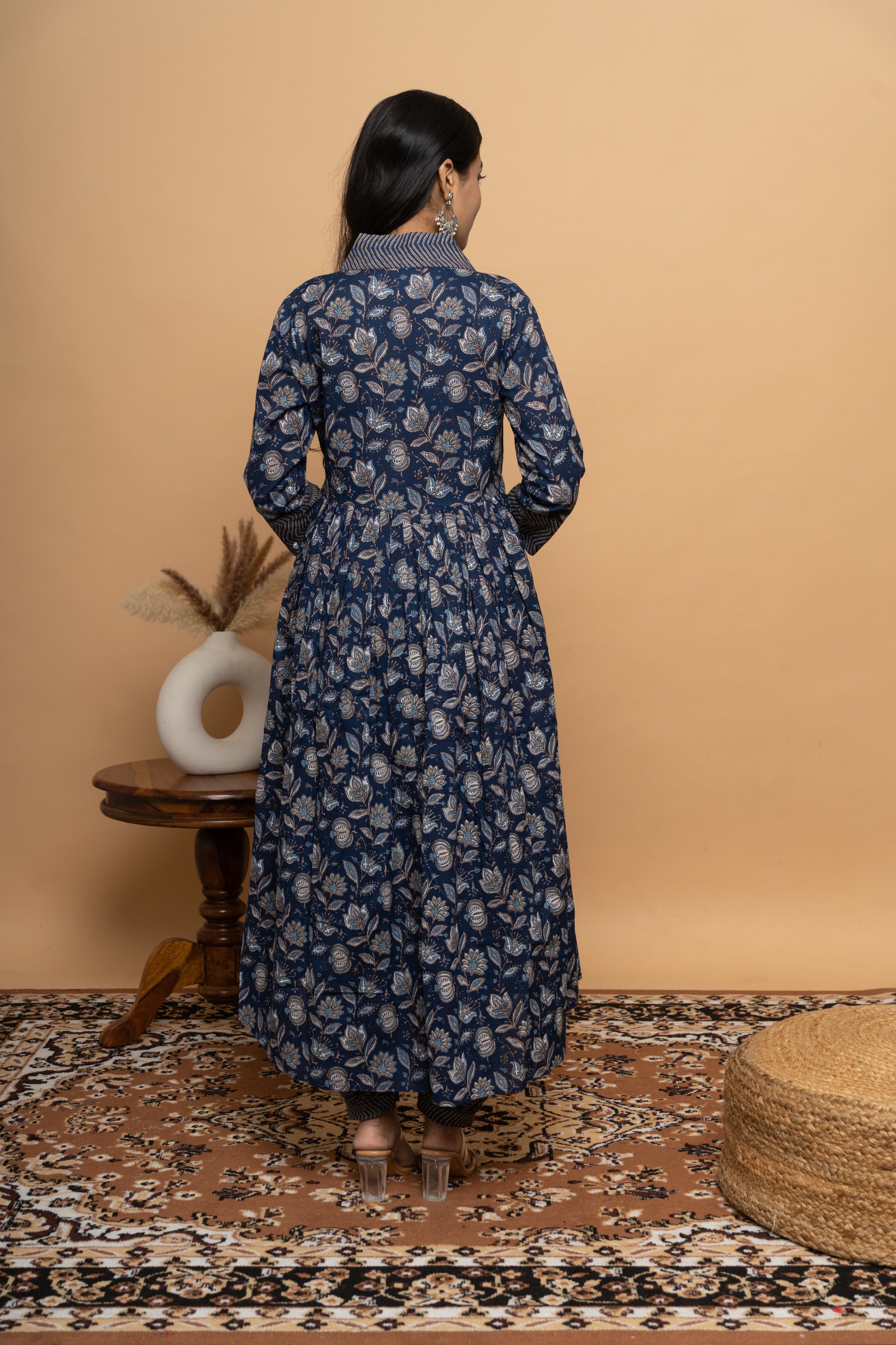 Back view of women’s indigo cotton suit set by Poshida