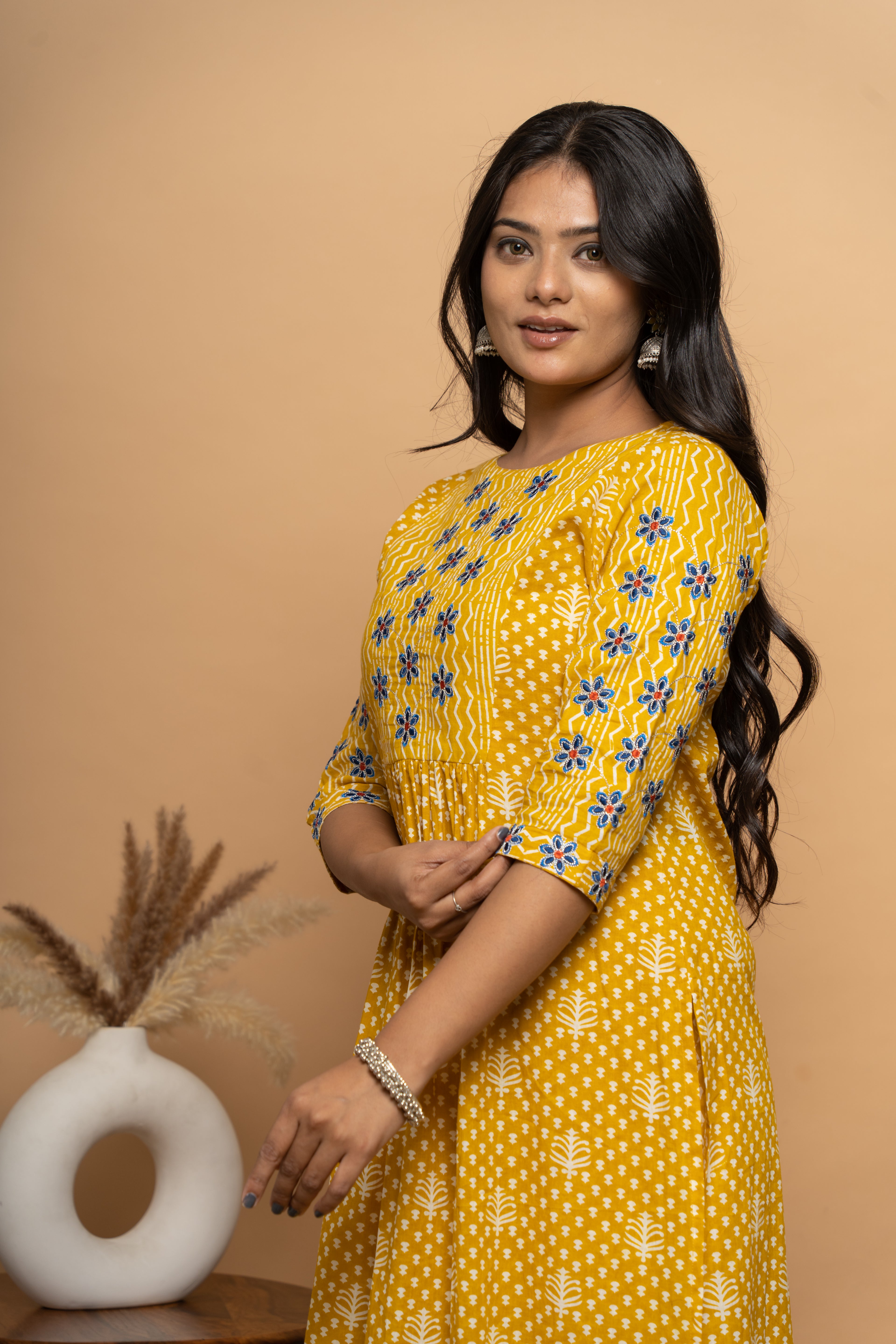 Side view of mustard cotton suit set for women by Poshida