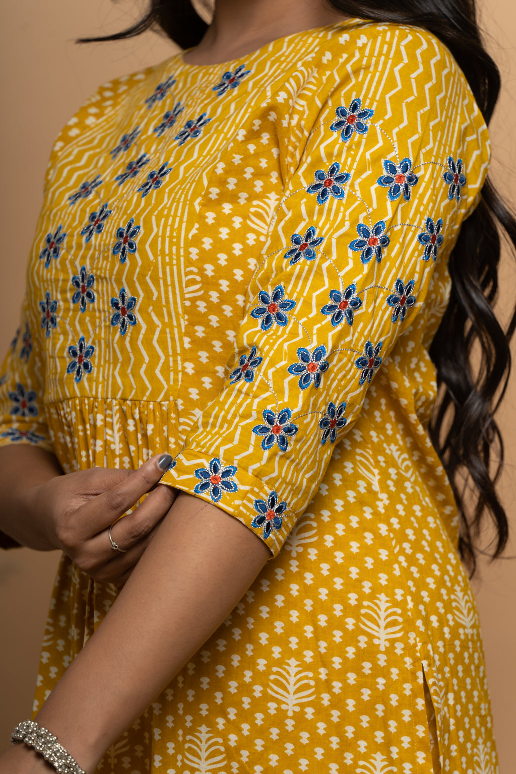 Side view of mustard cotton suit set for women by Poshida