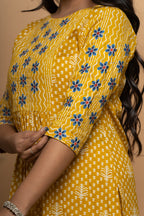 Side view of mustard cotton suit set for women by Poshida