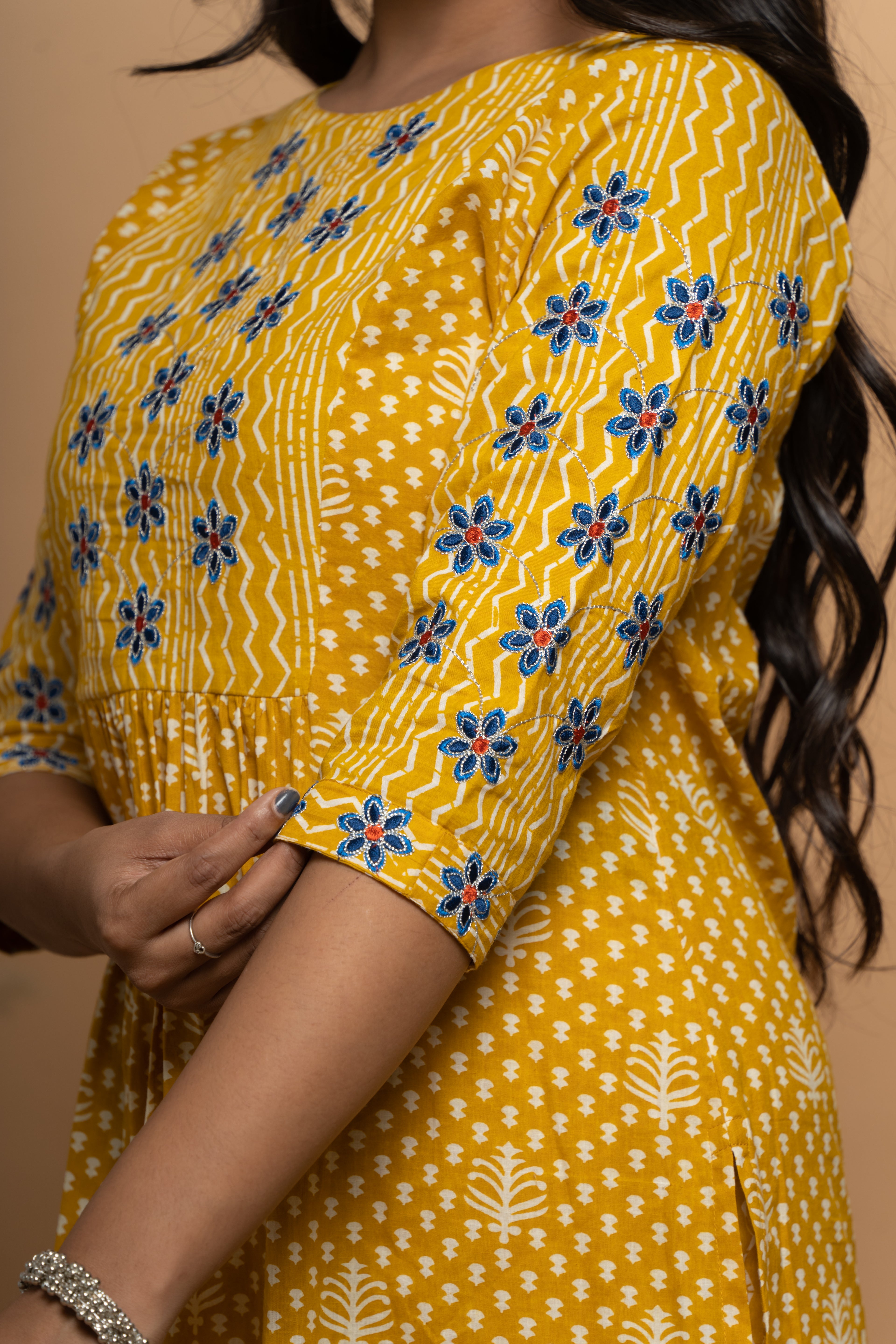 Side view of mustard cotton suit set for women by Poshida