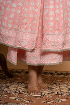 Close-up embroidery and fabric detail on light pink cotton suit set by Poshida