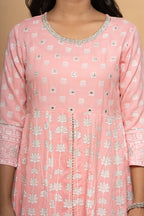 Close-up embroidery and fabric detail on light pink cotton suit set by Poshida
