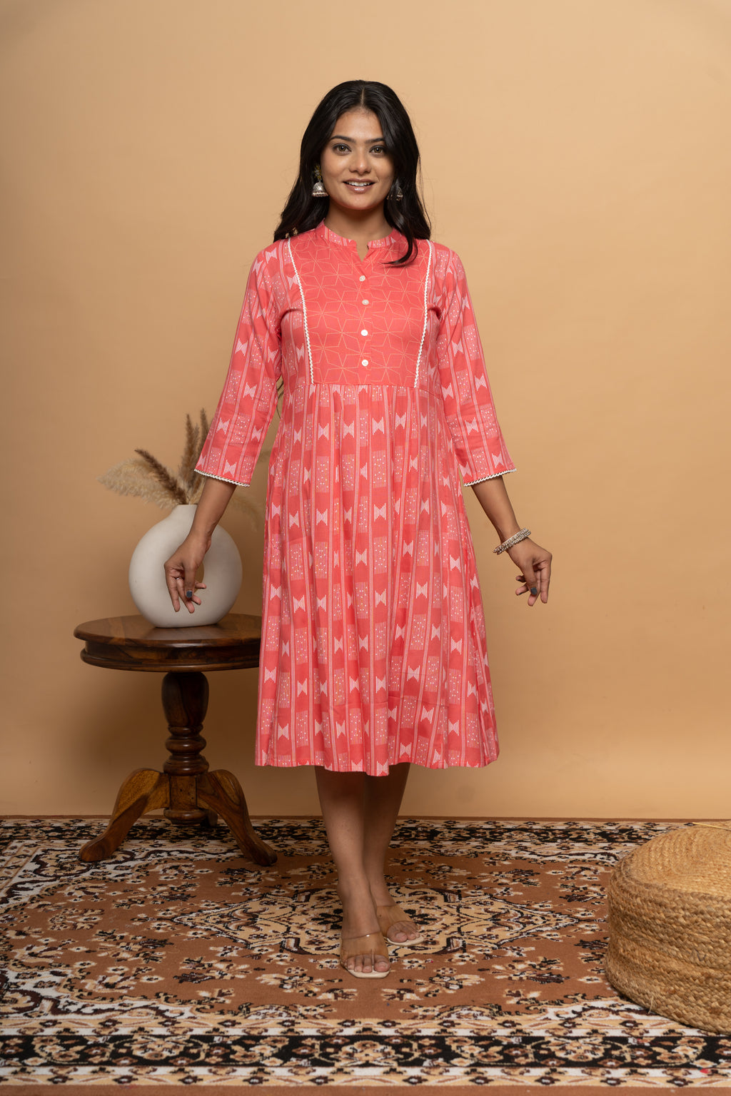Front view of elegant orange rayon dress for women by Poshida