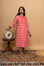 Side view of elegant orange rayon dress by Poshida