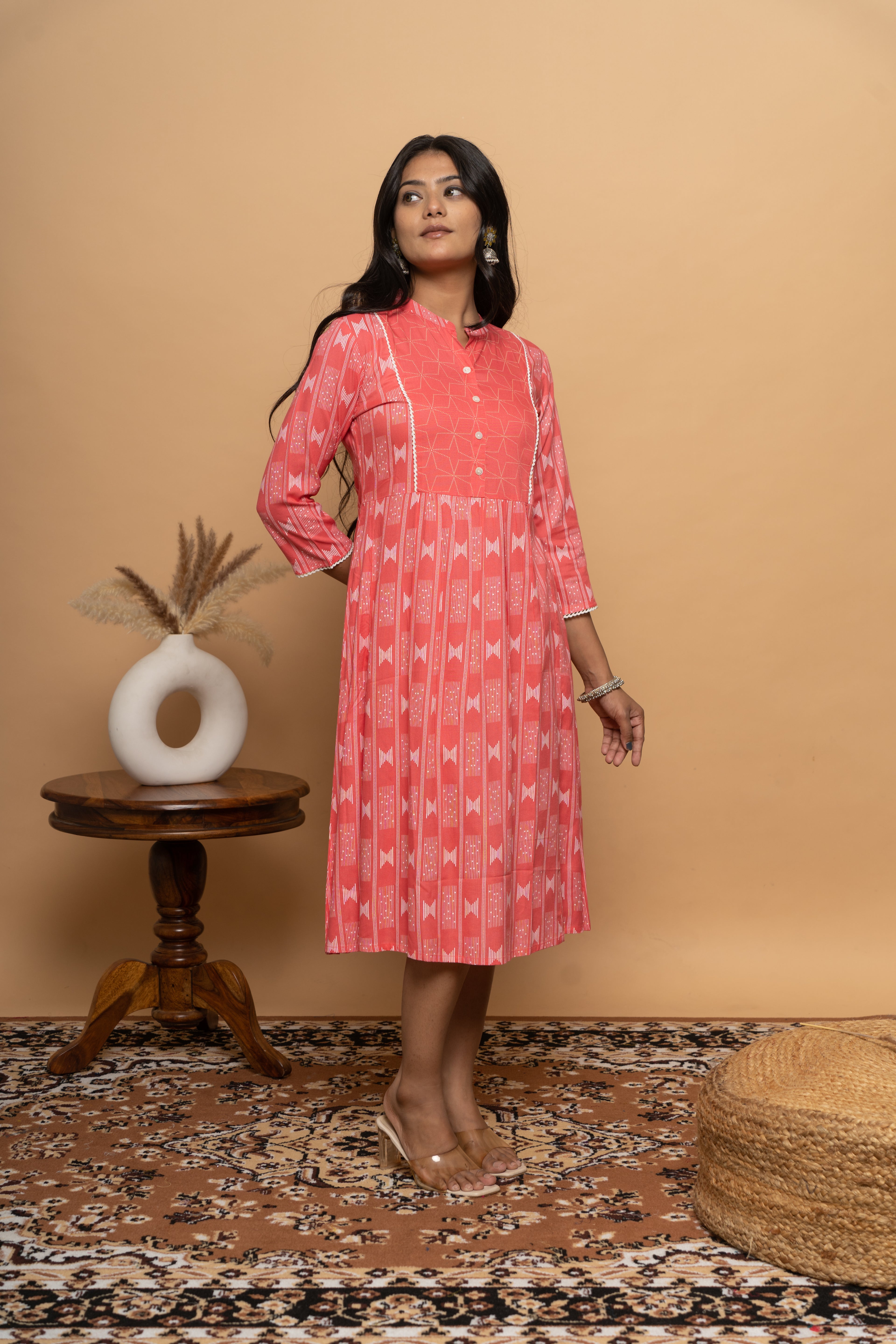 Side view of elegant orange rayon dress by Poshida