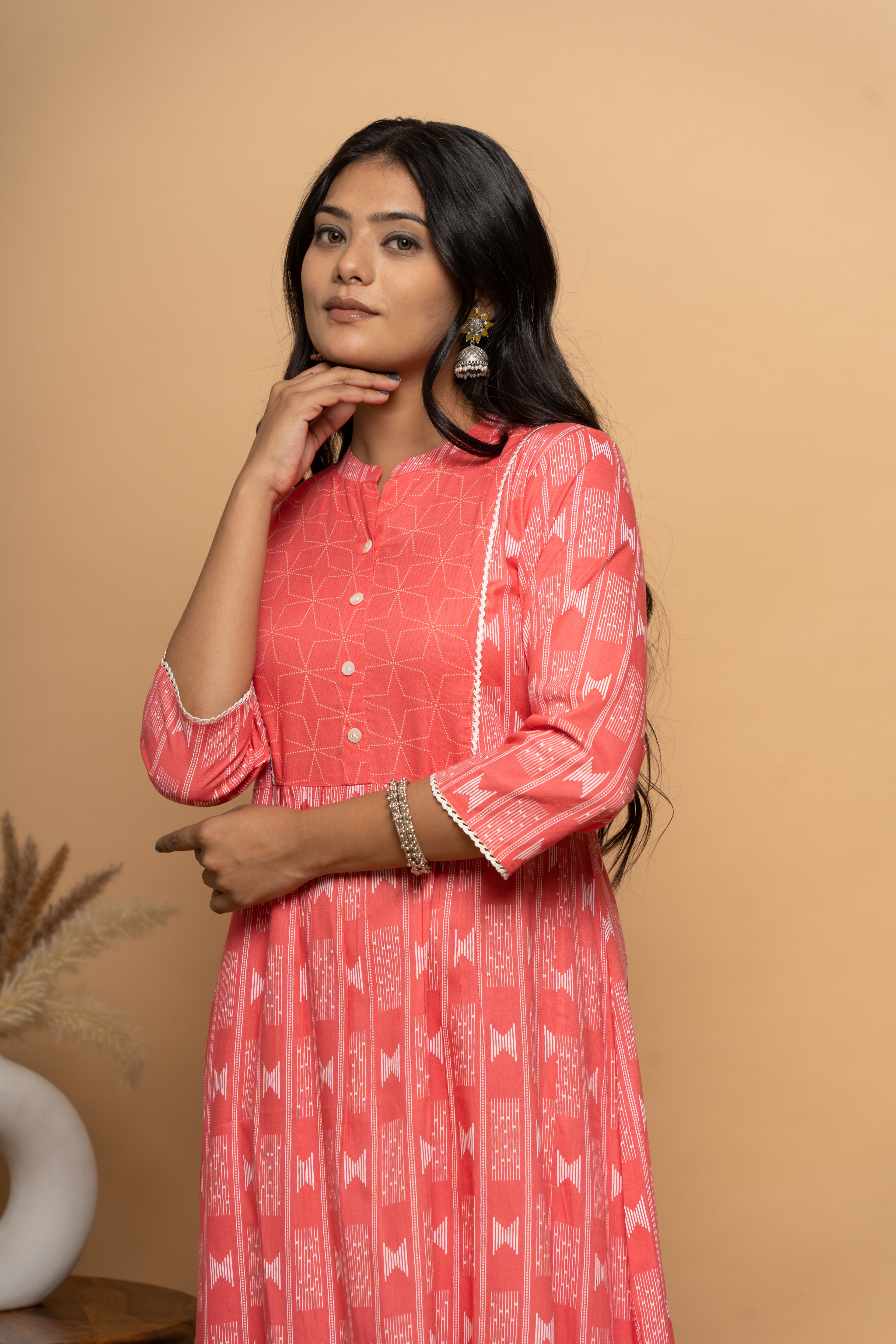 Front view of elegant orange rayon dress for women by Poshida