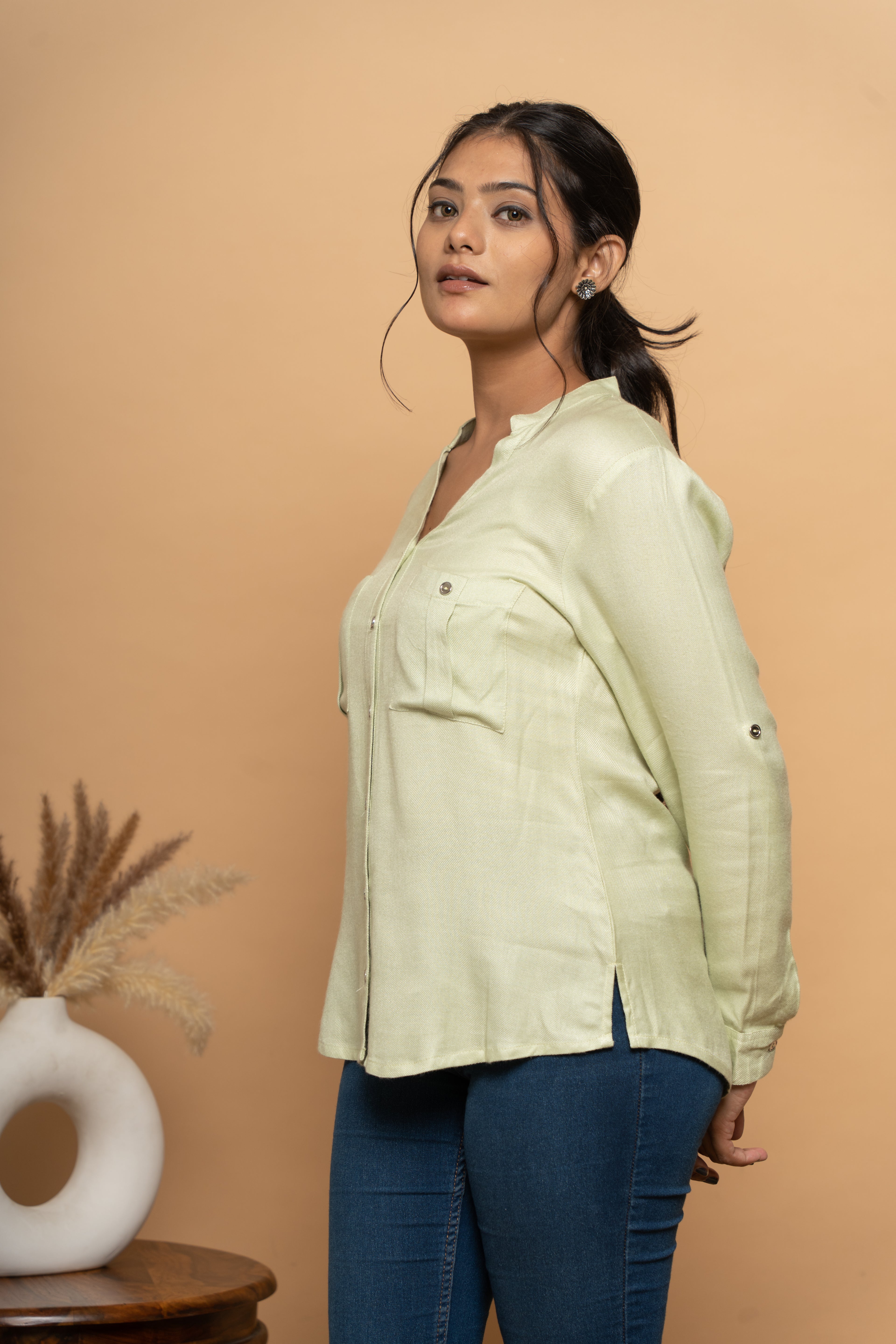 Side view of classic green women’s shirt by Poshida