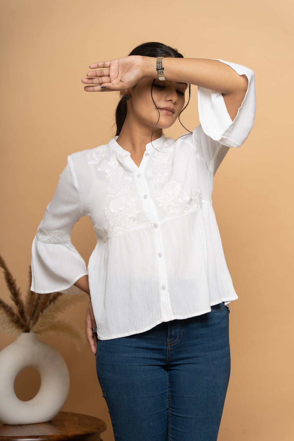 Front view of white schiffli flared top for women by Poshida