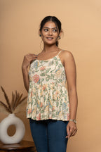 Side view of floral print flared top for women by Poshida