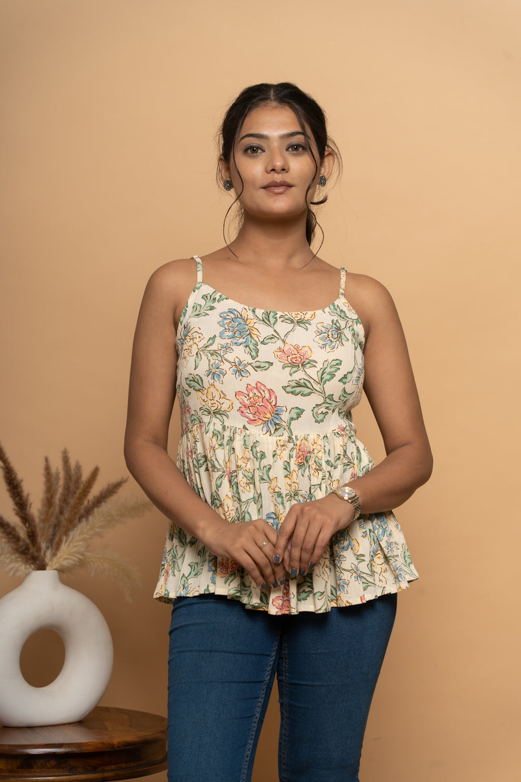 Front view of sleeveless flower print flared top by Poshida