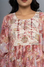 Close-up embroidery and print detail on pink kurta by Poshida