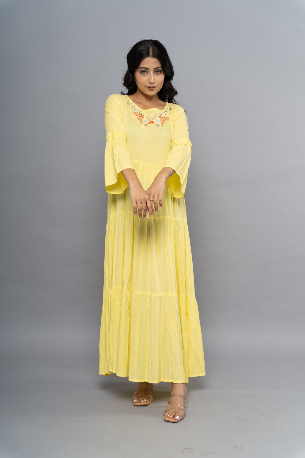 Front view of elegant yellow dress for women by Poshida