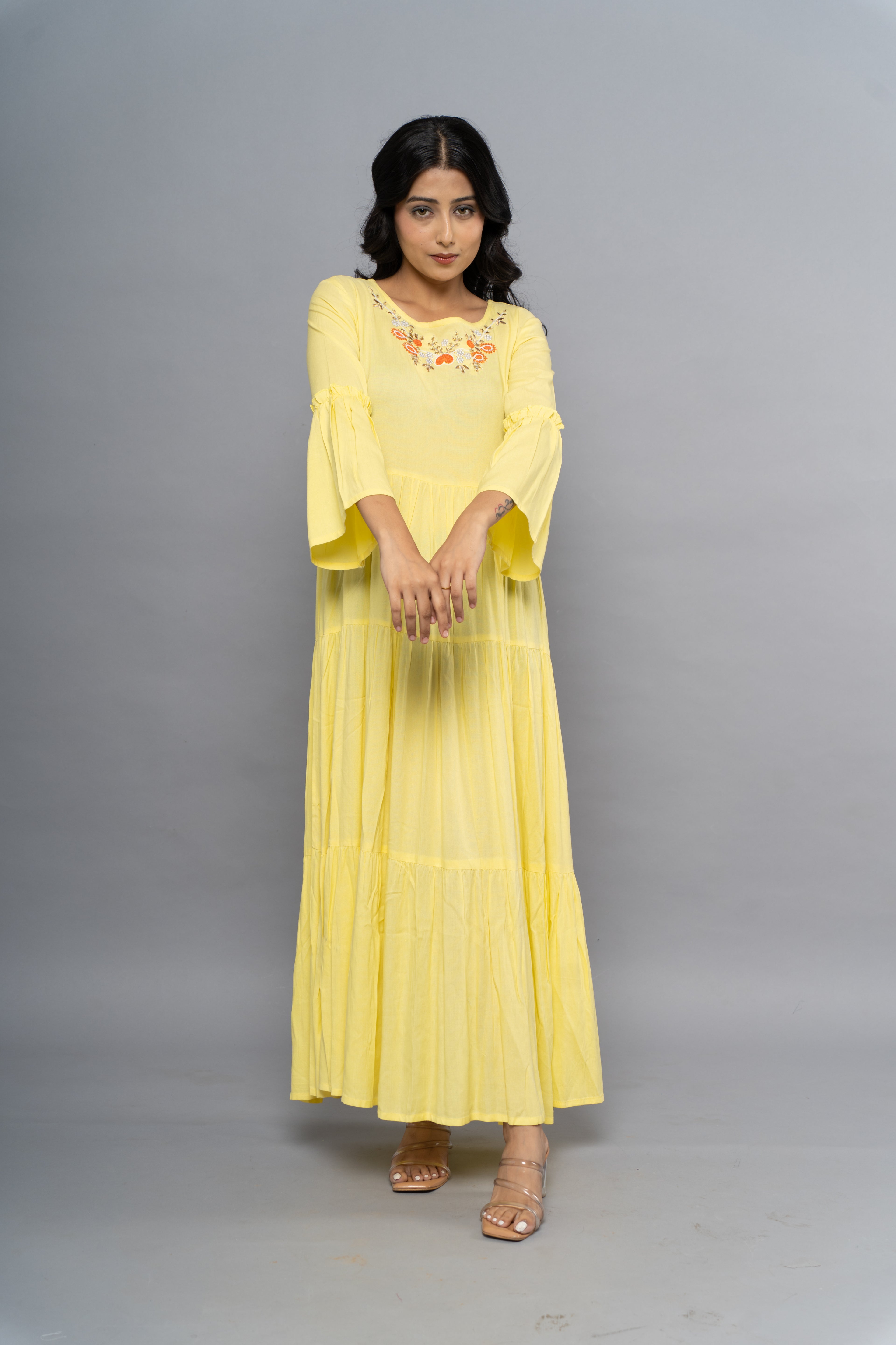 Front view of elegant yellow dress for women by Poshida