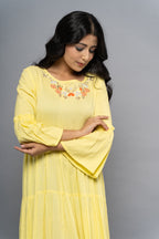 Fabric texture of elegant yellow dress by Poshida