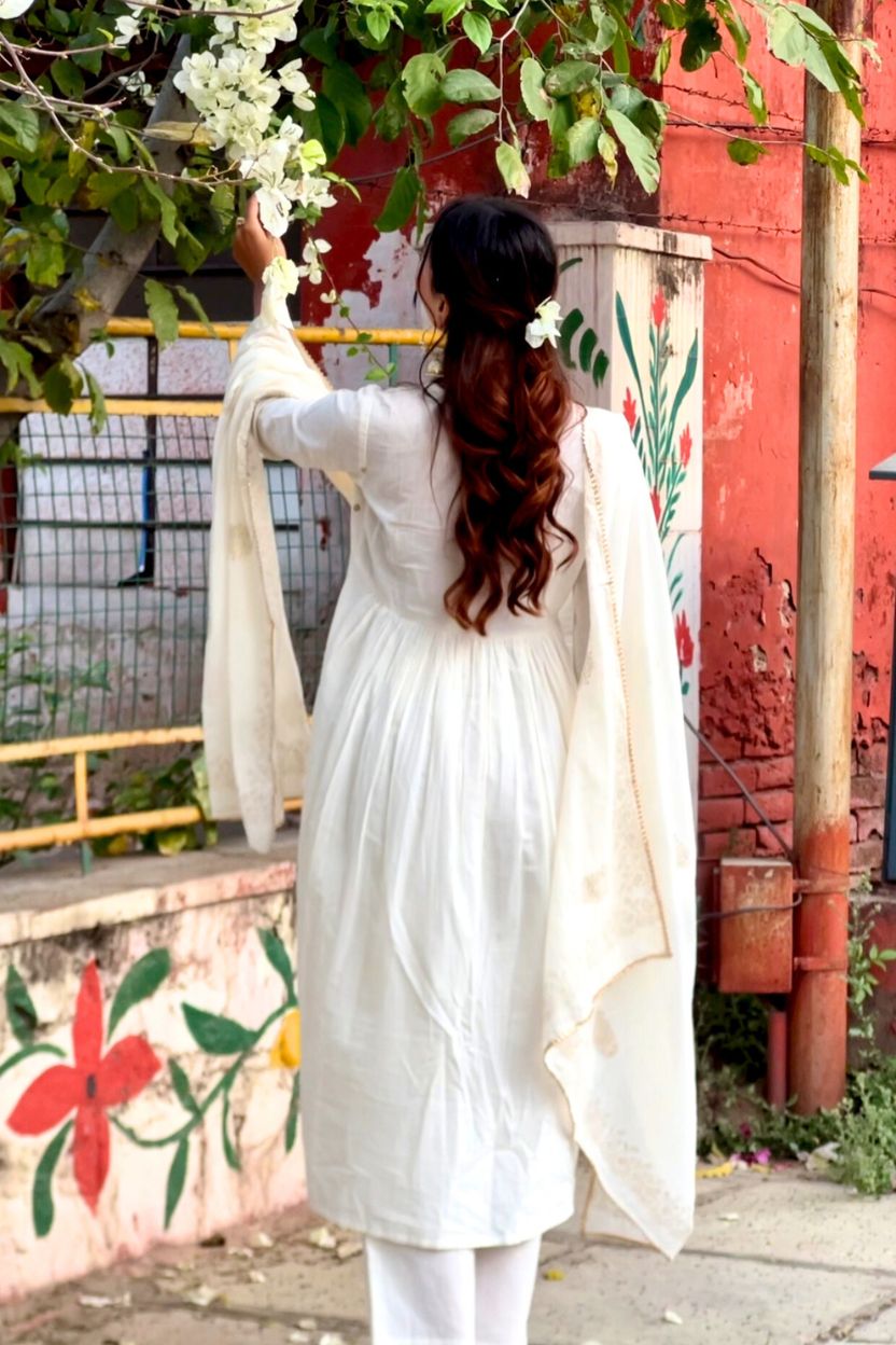 Shwetika White Cotton Suit Set with Gold Printed Mulmul Dupatta